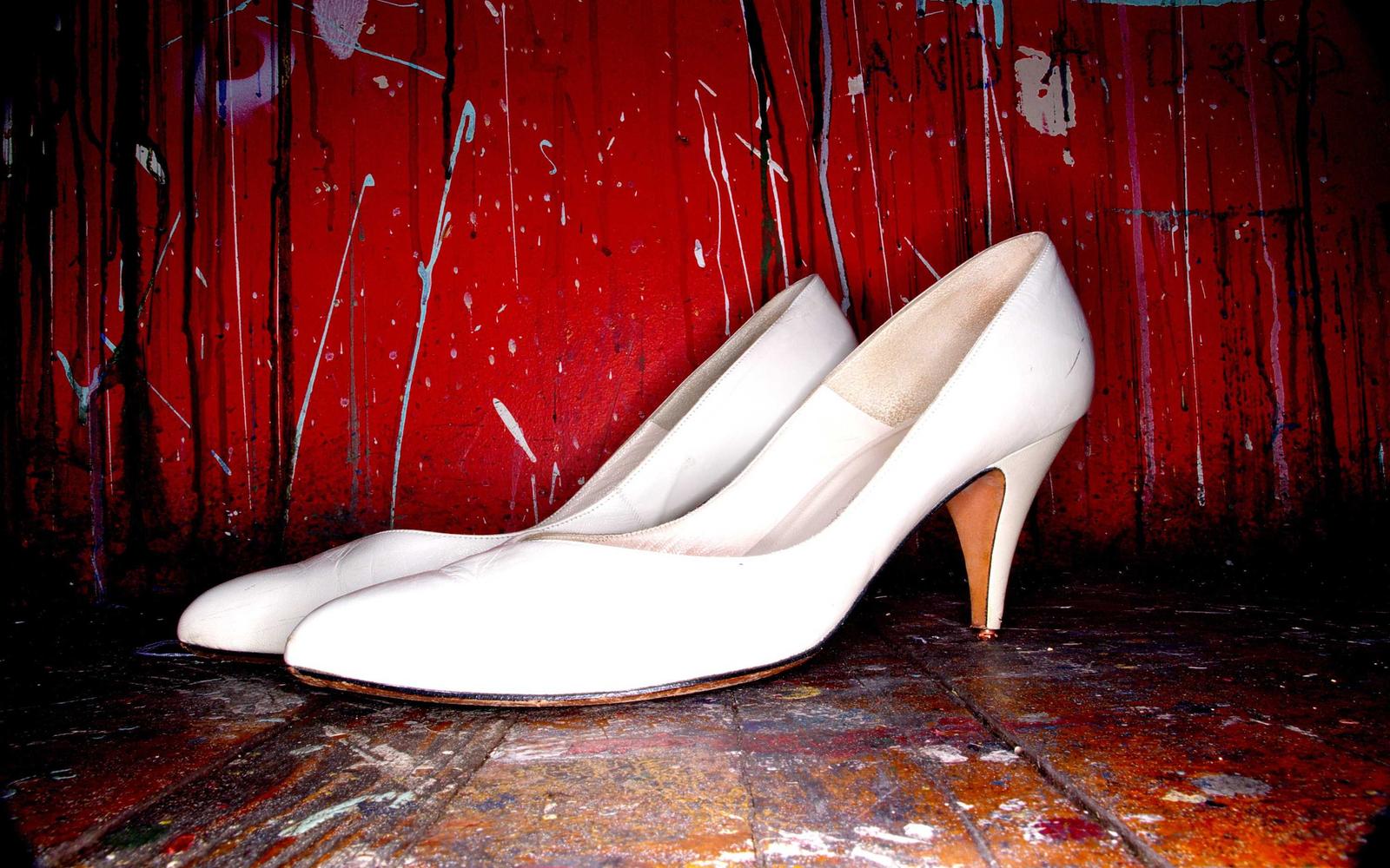 Cyclist on fitting bike in studio